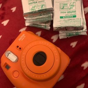 Polaroid camera with 6 packs of film